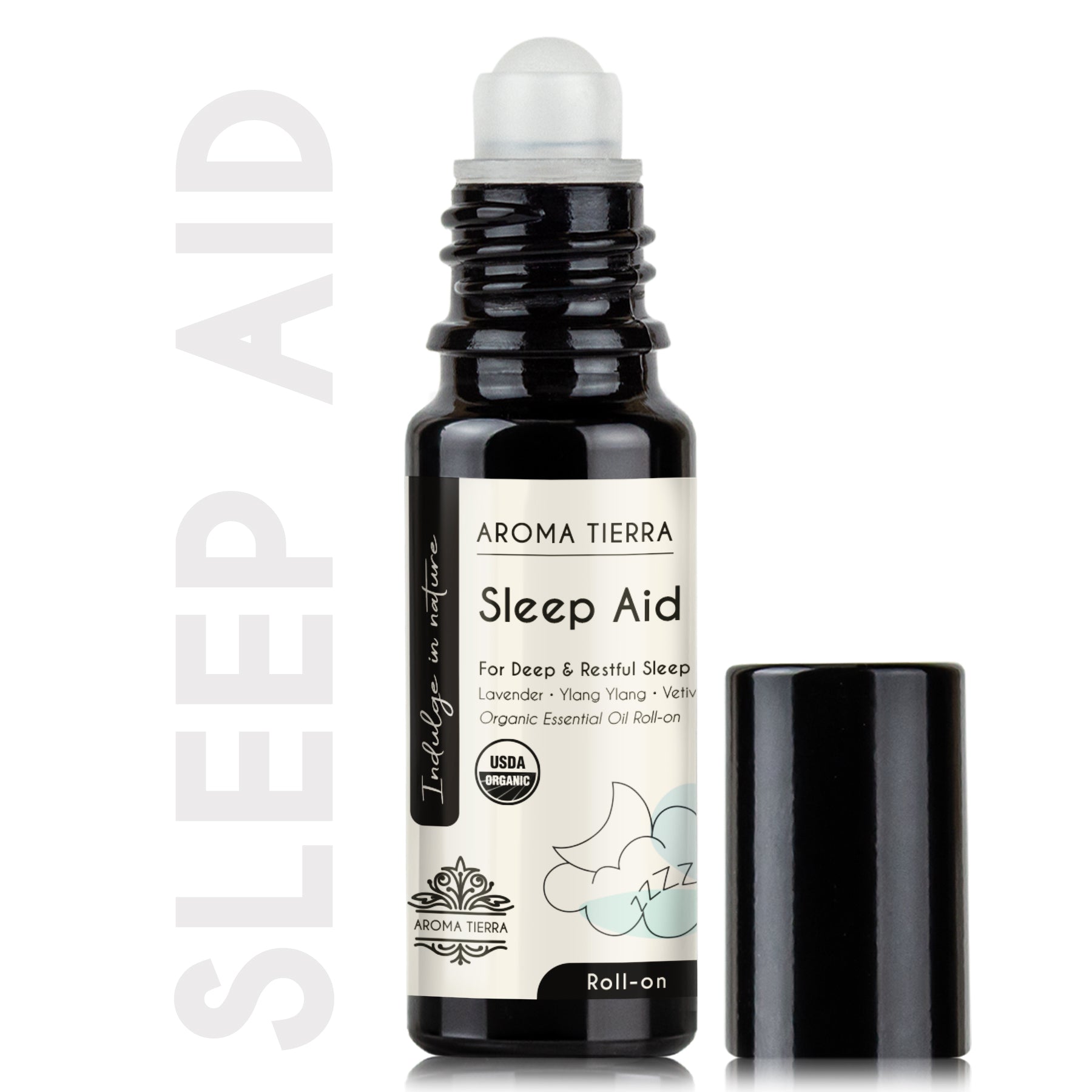 A black roll-on bottle of Aroma Tierra Sleep Aid with white and green labeling, indicating organic ingredients and sleep induction usage.