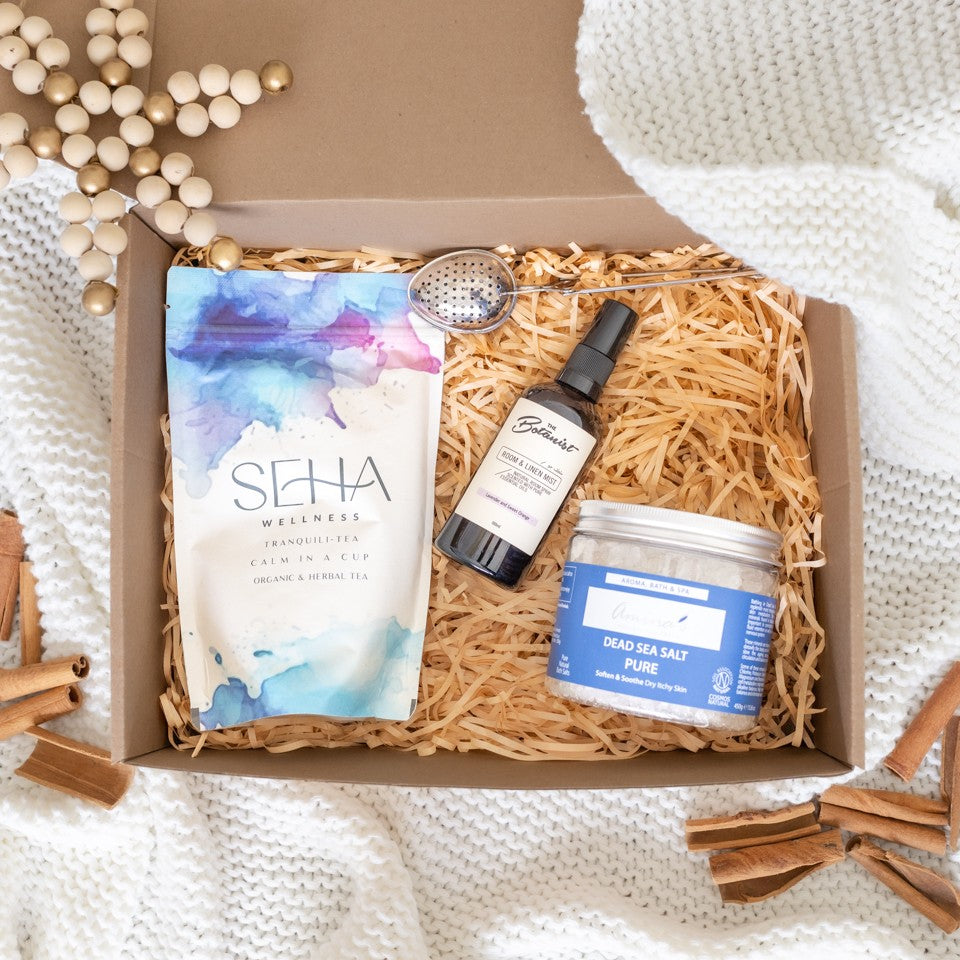 Christmas Unwind gift box styled with relaxing holiday elements, creating a calm and soothing festive atmosphere.