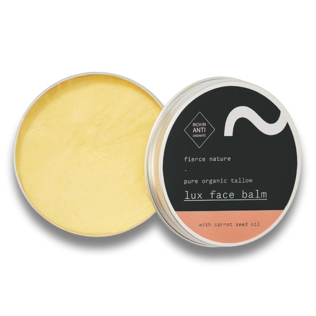 Lux face balm in a tin with a black label on a white background