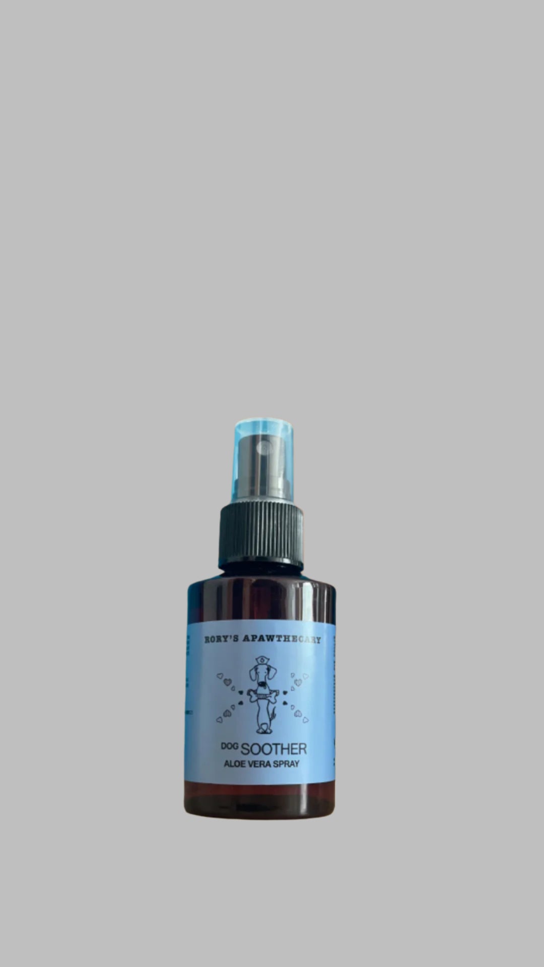 A 100ml spray bottle labeled 'Dog Soother Aloe Vera Spray' with a color gradient background.